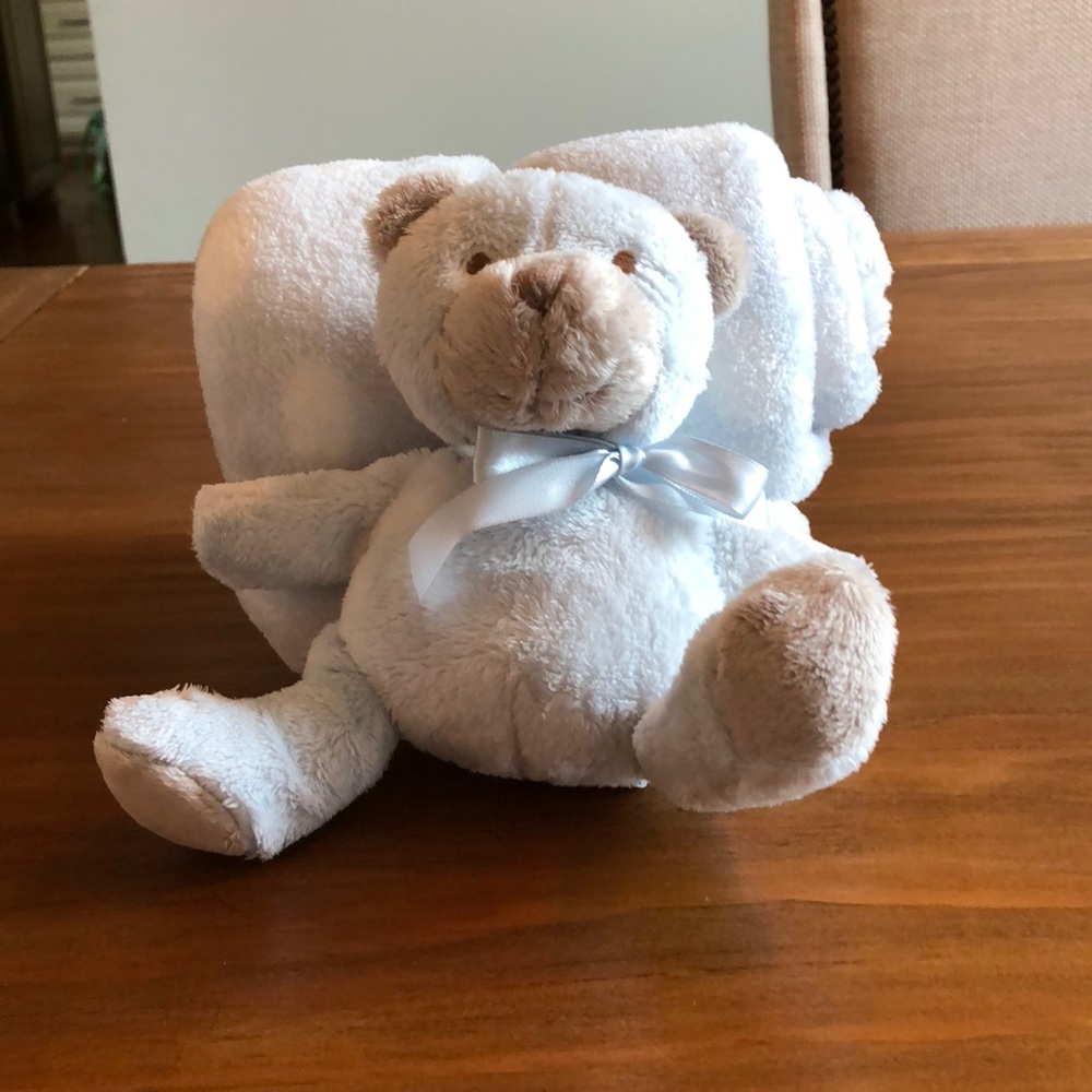 Plush bear with blanket